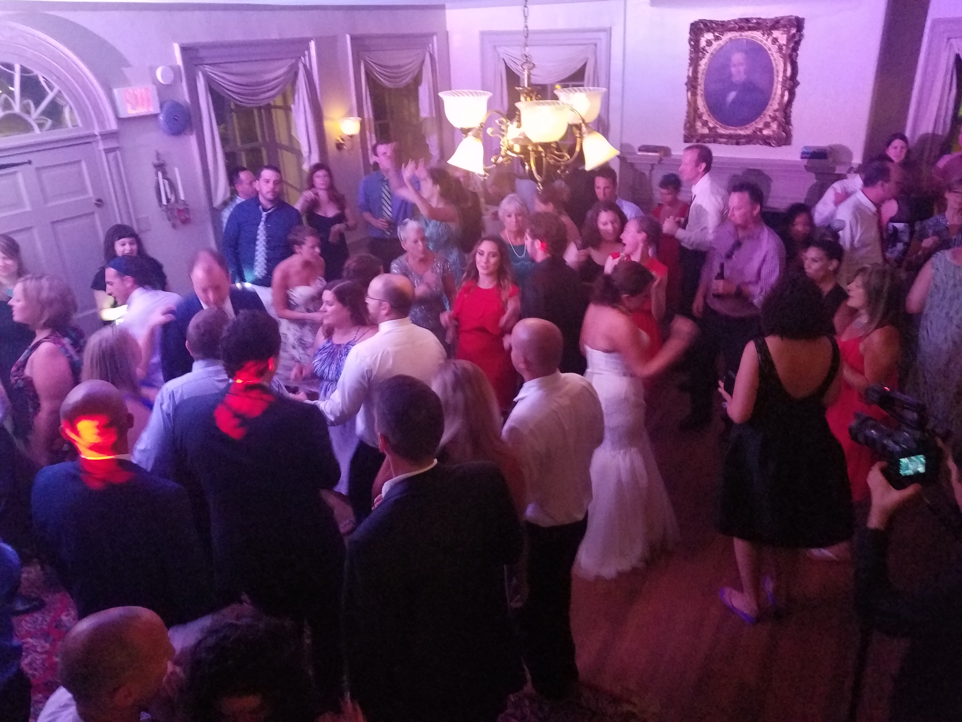 Bride dancing with her guests at a Wedding in Duportail House in Chesterbrook,Pa Chester county