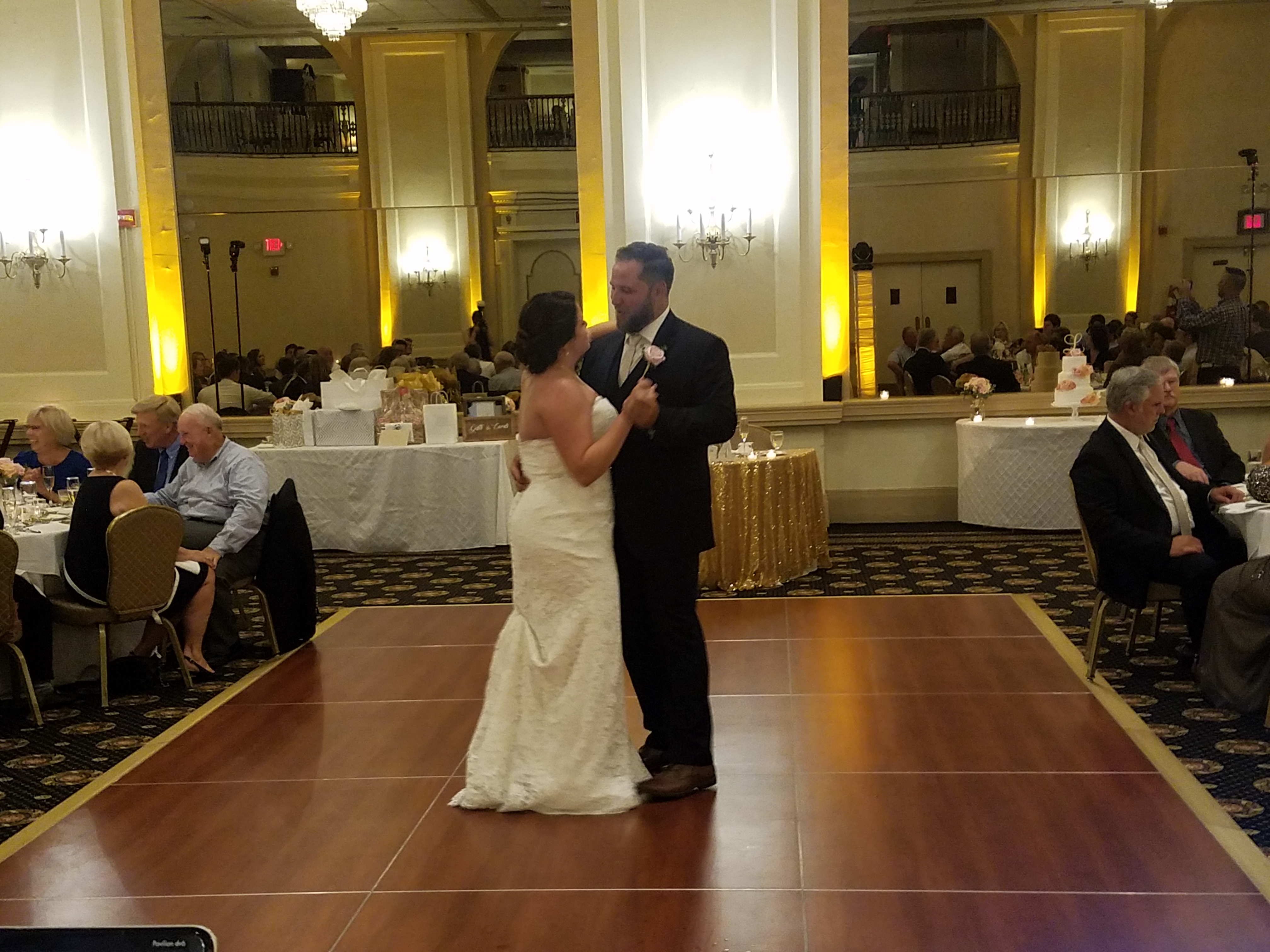 Kim & Greg's wedding First dance at The Historic Hotel Bethlehem in the Lehigh Valley with amber uplighting